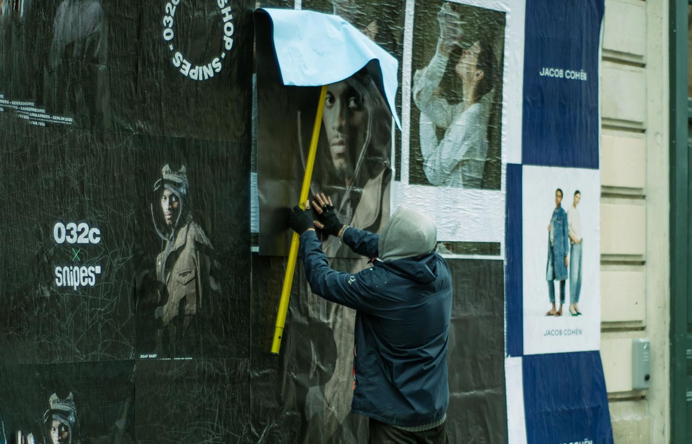 Wheatpaste poster installation by street teams in San Francisco